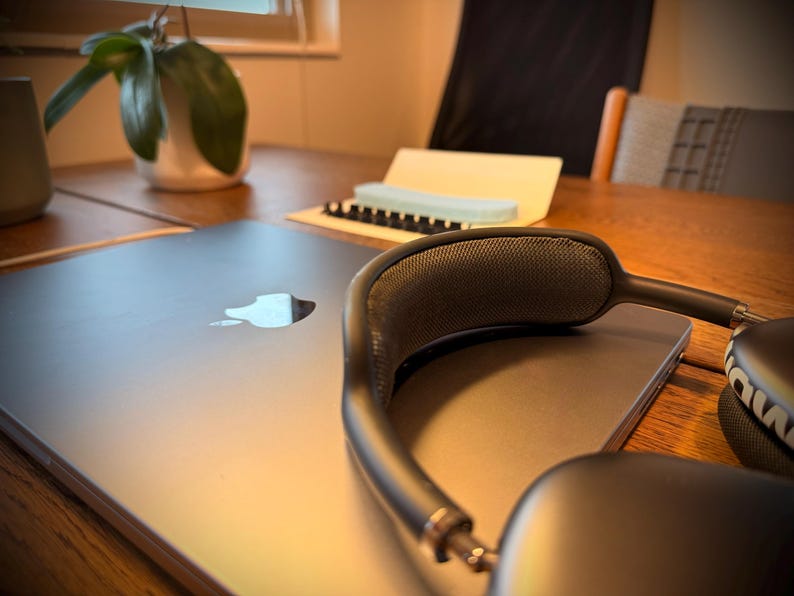 AirPods Max resting on a MacBook, restored after a PillowPod install